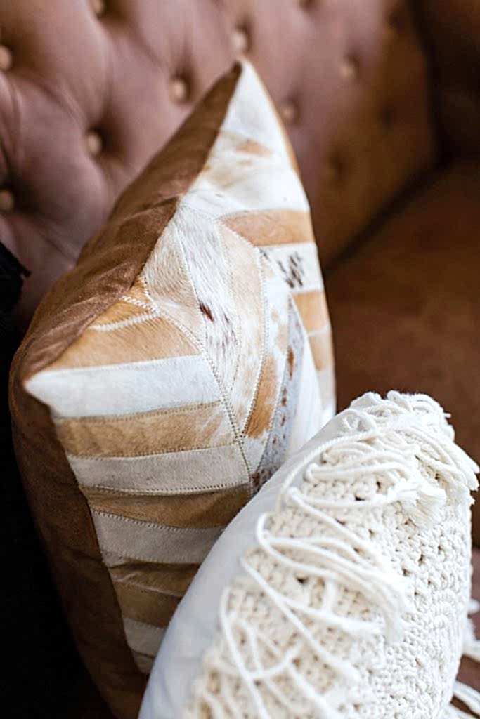 Interior Consultancy - brown lounge with white and brown pillows